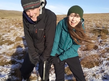 Tim and Lucy trying to pull a peat core out of the ground