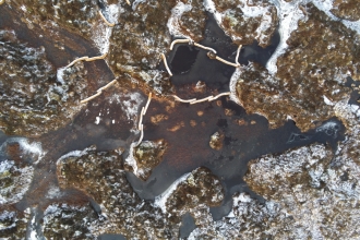 Aerial view of reservoir formed with coir logs on Stake Moss.