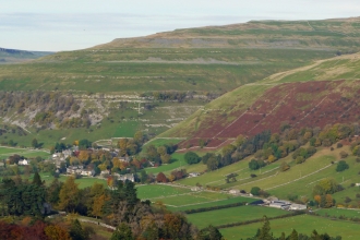 Buckden Pike rising above Buckden.