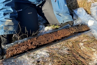 Laying a peat core in protective wrapping