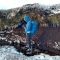 Image of YPP staff member surveying a hagged gully © Dom Hinchley