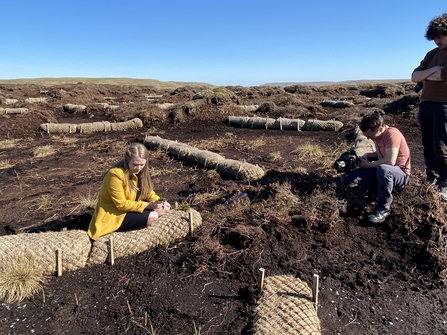 Image of Sarah Smout planting sphagnum © Jenny Sharman