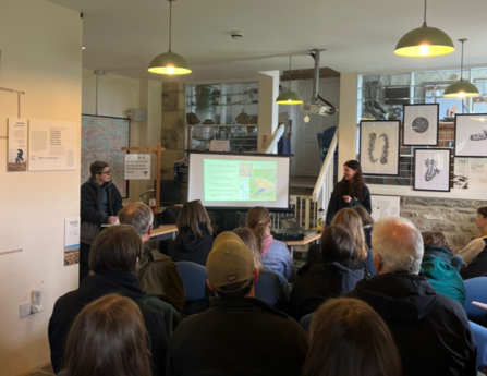 Participants watching a presentation at a Bugs on Bogs workshop