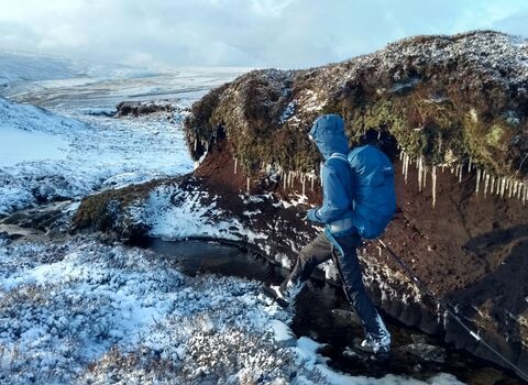Image of YPP staff member surveying a hagged gully © Dom Hinchley